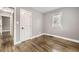 Bedroom featuring hardwood floors and window at 4425 S Lincoln St, Englewood, CO 80113