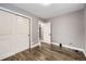 Bedroom with hardwood floors, large closet, neutral paint and ample natural light at 4425 S Lincoln St, Englewood, CO 80113