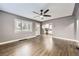 Spacious living room with hardwood floors and a view of the kitchen at 4425 S Lincoln St, Englewood, CO 80113