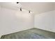 Bedroom with wall-to-wall carpeting and track lighting at 3480 S Dayton St, Denver, CO 80231