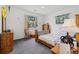 Cozy bedroom featuring a carpeted floor, plenty of sunlight, and ample space for relaxation and personalization at 11030 Glacier Park Cir, Parker, CO 80138