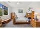 Spacious bedroom featuring natural light, hardwood furniture, and cozy decor at 11030 Glacier Park Cir, Parker, CO 80138