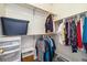 Walk-in closet equipped with shelving and hanging rods for maximum storage at 11030 Glacier Park Cir, Parker, CO 80138