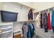 Walk-in closet with organized shelving and clothing racks, offering ample storage space at 11030 Glacier Park Cir, Parker, CO 80138