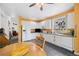 Bright kitchen featuring white cabinets, ample counter space, and a window overlooking the yard at 11030 Glacier Park Cir, Parker, CO 80138