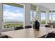 Bright dining area boasts scenic views through large windows, creating a delightful atmosphere at 974 N Faver Dr, Castle Rock, CO 80109