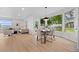 Bright dining area with large windows offering lush backyard views at 974 N Faver Dr, Castle Rock, CO 80109