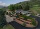 Beautiful home with manicured landscaping, a spacious driveway, and hillside views at 974 N Faver Dr, Castle Rock, CO 80109