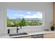 Kitchen sink with expansive windows showcasing lush, rolling hills at 974 N Faver Dr, Castle Rock, CO 80109
