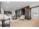 Spacious living room featuring hardwood floors, a fireplace, and an open floor plan at 974 N Faver Dr, Castle Rock, CO 80109