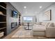 Inviting living room with a fireplace, built-in shelving, and comfortable seating at 974 N Faver Dr, Castle Rock, CO 80109