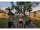 Inviting outdoor patio area with a cozy fire pit, perfect for relaxation and entertaining guests at 974 N Faver Dr, Castle Rock, CO 80109