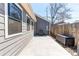 Spacious backyard featuring a concrete patio and wood fence, perfect for outdoor activities and gatherings at 3346 N Josephine St, Denver, CO 80205