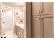 Bathroom view featuring vanity and sink, tub and shower combination and wall cabinet at 3346 N Josephine St, Denver, CO 80205