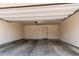 Clean and spacious garage interior, with concrete flooring, featuring an interior door at 3346 N Josephine St, Denver, CO 80205