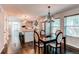 Open concept kitchen with dining area features stainless steel appliances and modern lighting at 3346 N Josephine St, Denver, CO 80205
