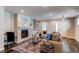 Comfortable living area with a fireplace, stylish decor, and ample seating space at 3346 N Josephine St, Denver, CO 80205