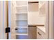 Bright walk-in closet with custom shelving and drawers provides ample storage in a well-designed space at 3346 N Josephine St, Denver, CO 80205