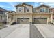 Inviting two-story townhome featuring attached two-car garage and well-maintained front yard at 17809 Fox St, Broomfield, CO 80023