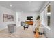 Inviting living room with ample seating, stylish decor, and large windows for natural light at 17809 Fox St, Broomfield, CO 80023