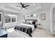 Stylish main bedroom featuring recessed lighting, a large window, and neutral decor at 17809 Fox St, Broomfield, CO 80023