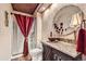 Bathroom with glass enclosed shower, granite countertop, and custom sink at 527 Stonemont Dr, Castle Pines, CO 80108