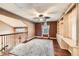 Bonus room with sloped ceilings, custom built-ins, hardwood flooring and great natural light at 527 Stonemont Dr, Castle Pines, CO 80108