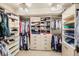 Organized walk-in closet with shelving and drawers at 527 Stonemont Dr, Castle Pines, CO 80108
