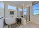 Elegant bathroom with a standalone tub, walk-in shower, and stylish fixtures at 13960 Hanging Lake St, Parker, CO 80138
