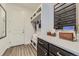 Convenient mudroom with built-in bench, shelving, and organizational spaces near the entryway at 13960 Hanging Lake St, Parker, CO 80138