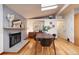 Bright dining area with hardwood floors and a wood dining table at 2590 S Meade St, Denver, CO 80219