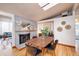 Bright dining area with hardwood floors and a wood dining table at 2590 S Meade St, Denver, CO 80219