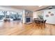 Bright dining area with hardwood floors and a view into the living room at 2590 S Meade St, Denver, CO 80219