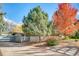 Charming mid-century home with a landscaped yard and driveway at 2590 S Meade St, Denver, CO 80219