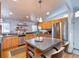 Modern kitchen with stainless steel appliances and light wood cabinets at 2590 S Meade St, Denver, CO 80219