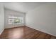 Sun-lit bedroom with expansive window view at 3845 Canyon Ranch Rd # 102, Highlands Ranch, CO 80126