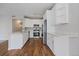 A stylish kitchen featuring stainless steel appliances, white cabinets, and stone countertops, perfect for entertaining at 3845 Canyon Ranch Rd # 102, Highlands Ranch, CO 80126