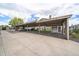 Spacious covered parking area for residents, offering protection from the elements at 3845 Canyon Ranch Rd # 102, Highlands Ranch, CO 80126