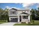 Two-story house with gray siding, a front porch, and a two-car garage at 9165 Truckee Ct, Commerce City, CO 80022