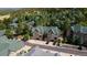 Aerial view of a townhome community surrounded by lush forest with ample parking at 31112 Black Eagle Dr # 101, Evergreen, CO 80439