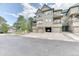 Attractive townhome with attached two-car garage and covered entry at 31112 Black Eagle Dr # 101, Evergreen, CO 80439