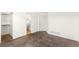 A secondary bedroom with closet, carpet, and door to the adjacent bathroom at 19804 E Villanova Pl, Aurora, CO 80013