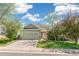 Traditional home featuring a spacious lawn and an attached two-car garage at 19804 E Villanova Pl, Aurora, CO 80013