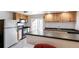 An eat-in kitchen with lots of cabinets and access to the backyard at 19804 E Villanova Pl, Aurora, CO 80013
