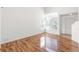 Bright living room with large windows, hardwood floors and neutral paint at 19804 E Villanova Pl, Aurora, CO 80013