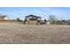 Spacious backyard with a view of the home's back elevation, offering outdoor living at 59 S De Gaulle St, Aurora, CO 80018