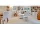 Comfortable sitting room with built-in bookshelves and ample seating at 199 Lafayette St, Denver, CO 80218
