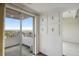 Balcony with views of the city and built-in cabinets in living room at 130 N Pearl St # 1103, Denver, CO 80203
