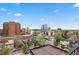 Scenic city view with tennis court and clear blue sky and puffy clouds at 130 N Pearl St # 1103, Denver, CO 80203