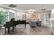 Elegant common area with grand piano, comfortable seating, and modern design at 130 N Pearl St # 1103, Denver, CO 80203